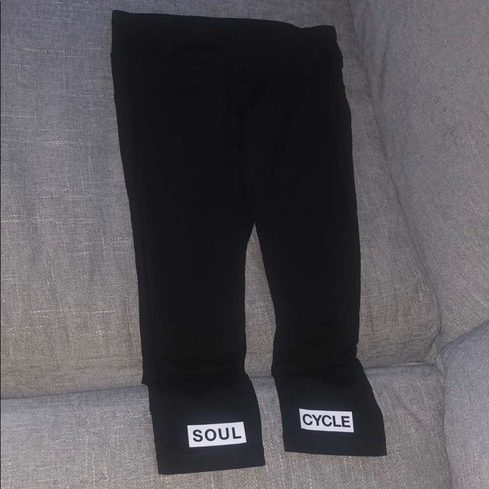 SoulCycle x Lululemon leggings with ankle writing